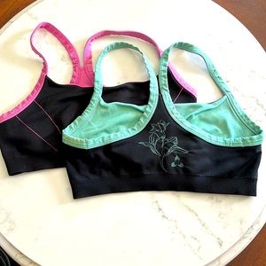 Pair of Rebook Reversible Sports Bras